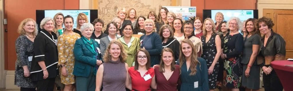Christy Pettit and women for nature mentoring participants gathered together.