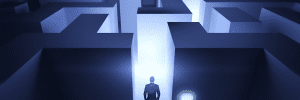 Person looking ahead at a challenging maze path.