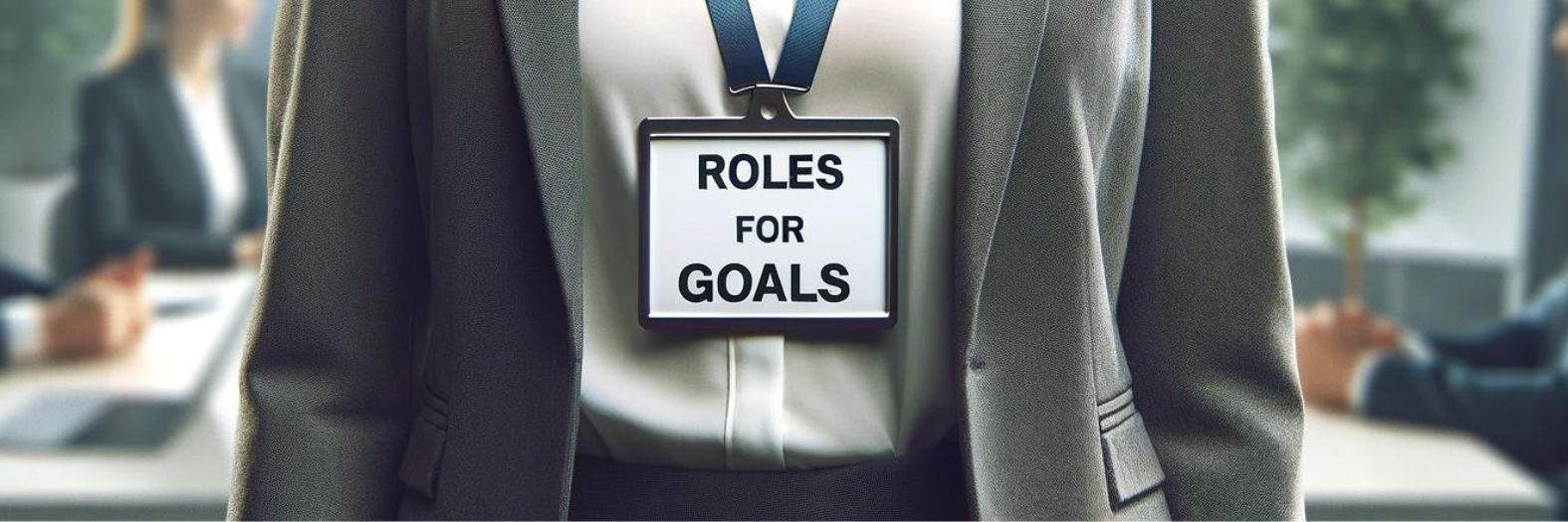 business woman wearing a lanyard that says "ROLES FOR GOALS"