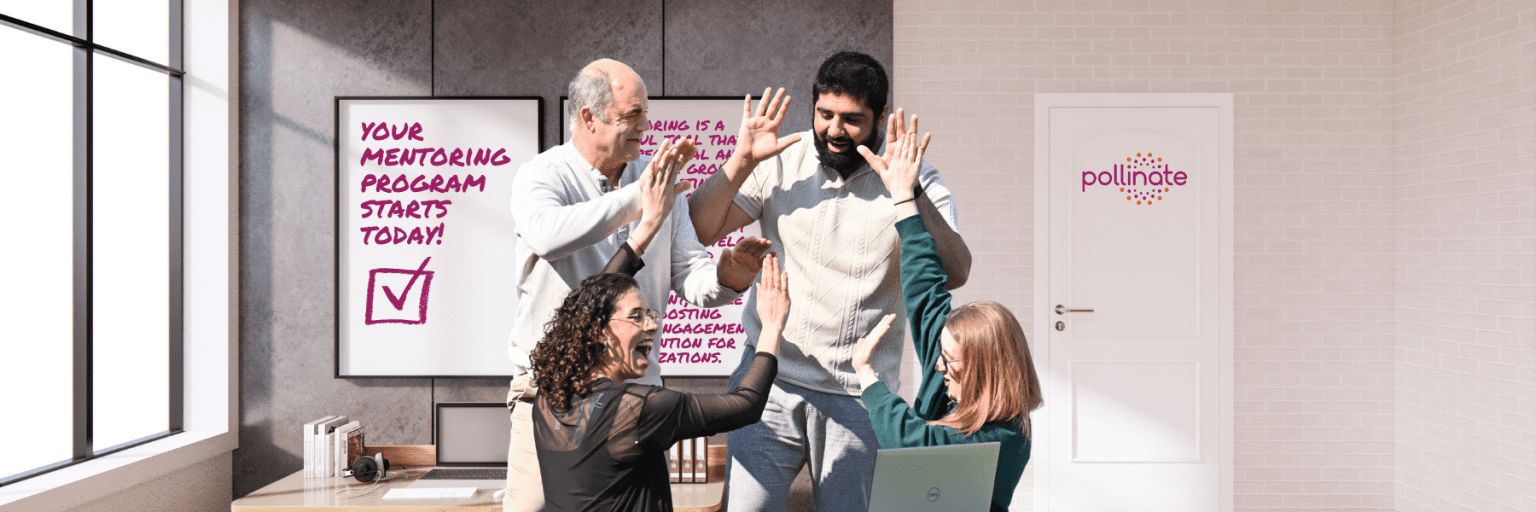 a group of people high-fiving at an office starting a mentoring program.